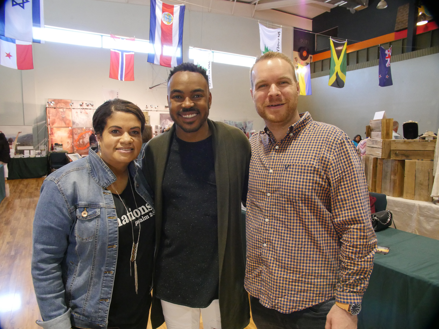 Jermaine, on staff at Christian International Takes Pictures with Conference Attendees